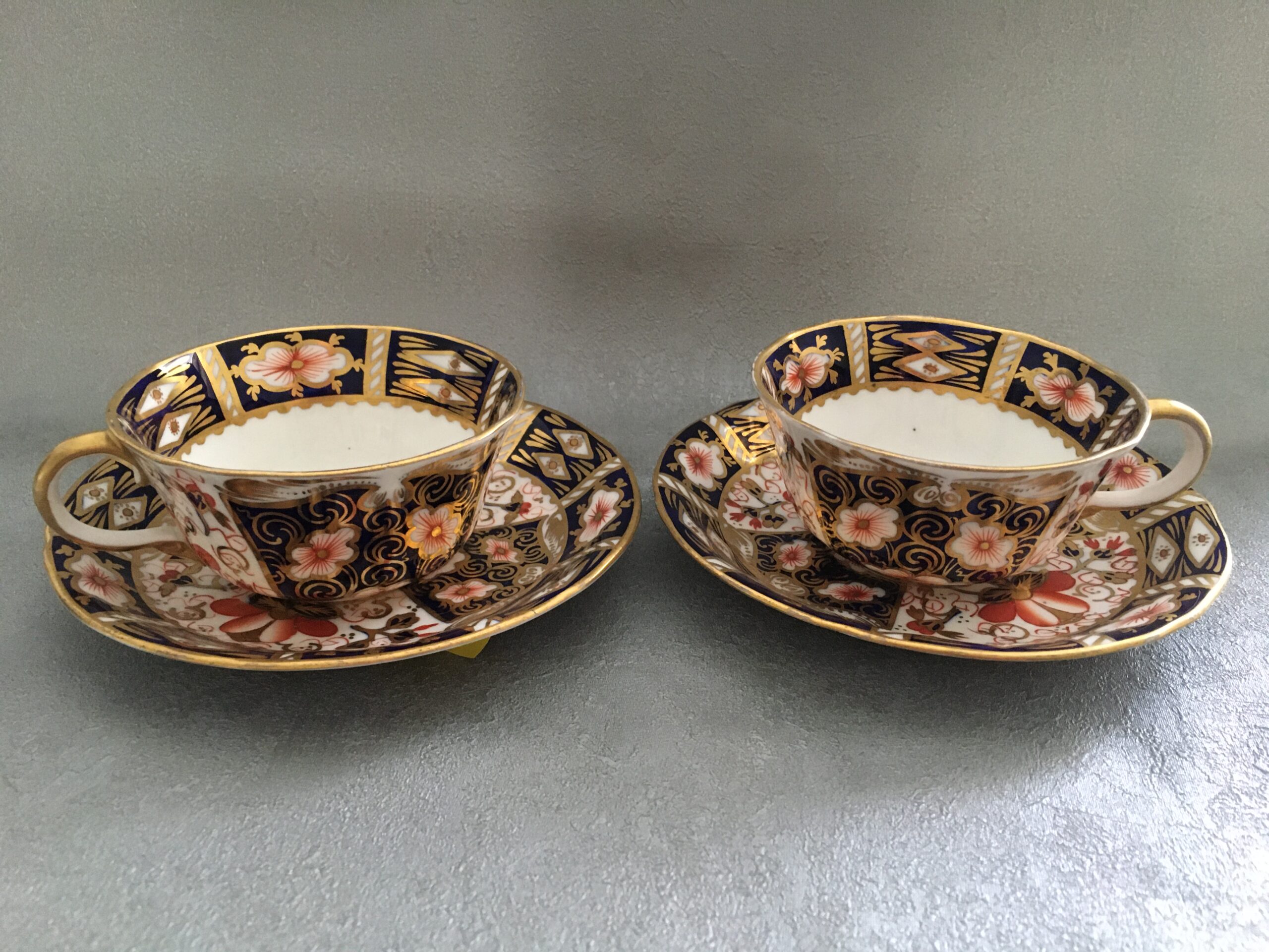 Pair of Crown Derby cups and Saucers 2459b