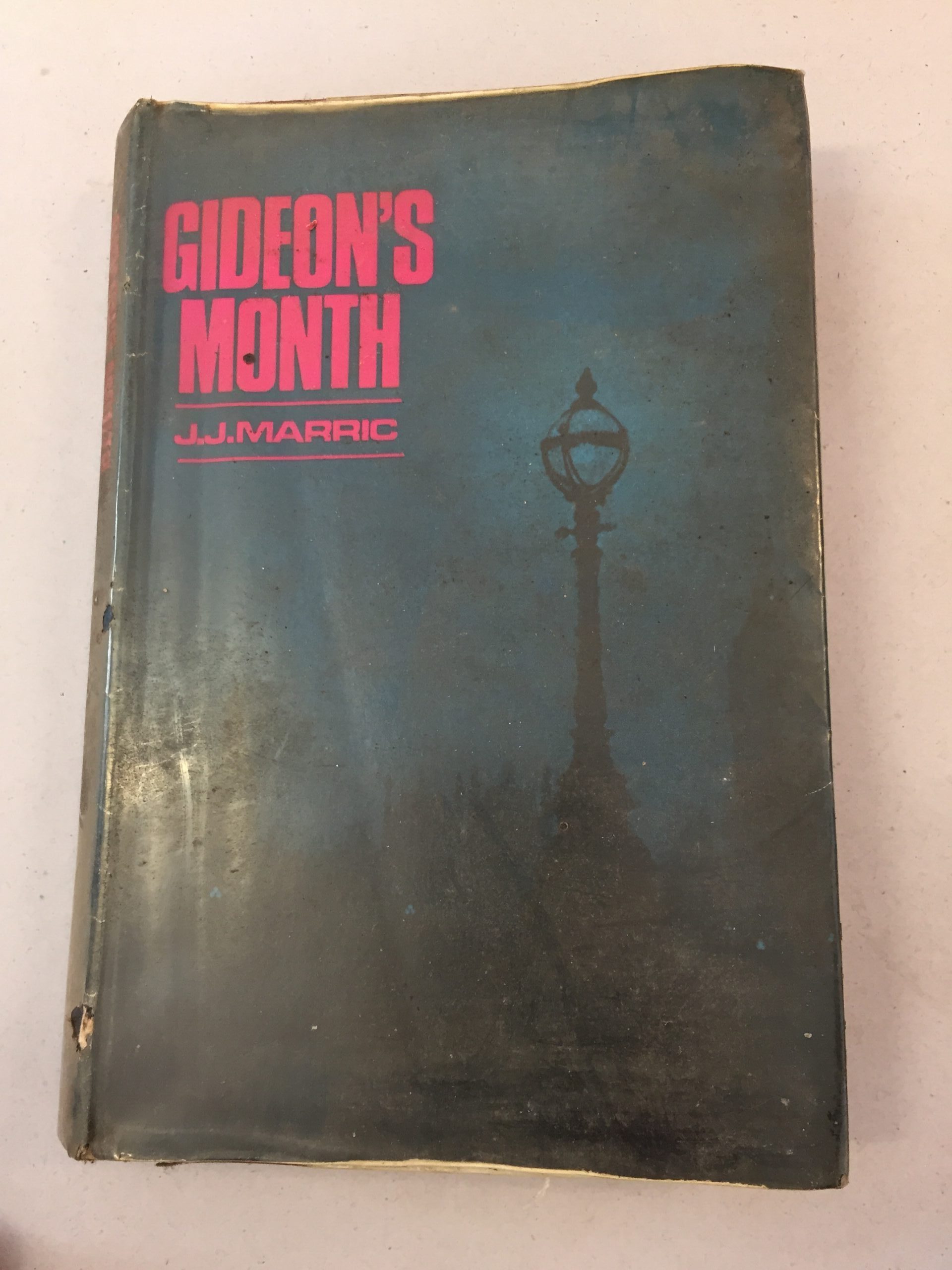 Gideon's Month by J.J. Marric (a pseudonym for prolific crime writer John Creasey), published by Hodder and Stoughton