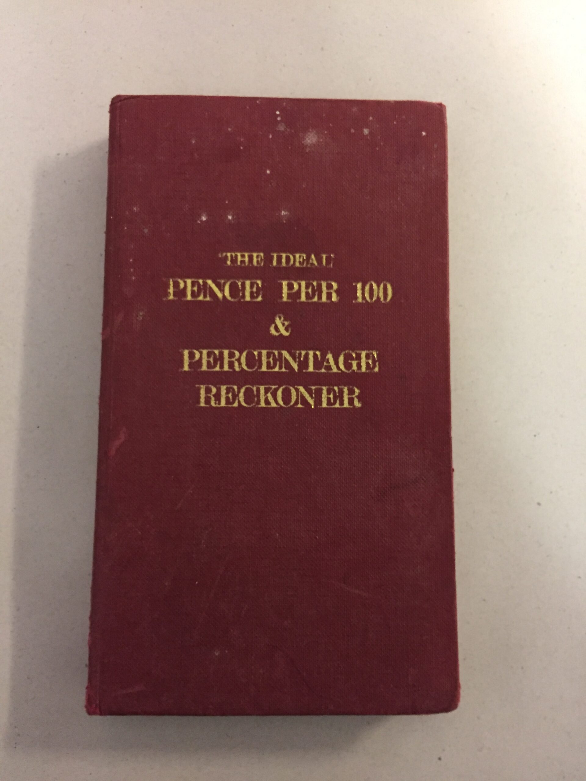 The 'Ideal' Pence Per 100 and Decimal Percentage Reckoner, an antique mathematics table book compiled by R. M. G. Inglis and published by Gall & Inglis (Reckoners) Ltd