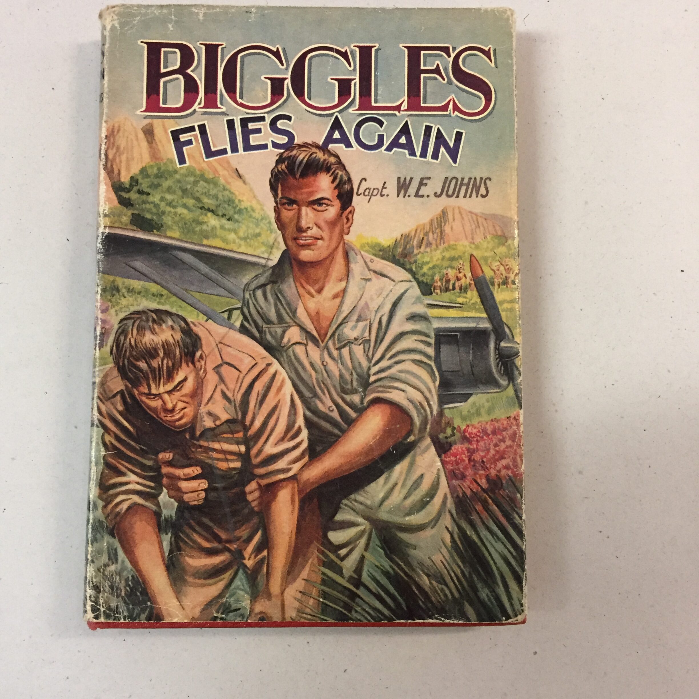 Biggles Flies Again by Captain W. E. Johns, likely from a 1960s edition published by Dean & Son