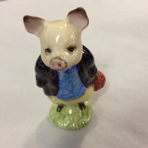Beswick England Beatrix Potter ceramic figurine of "Pigling Bland" with a printed brown copyright backstamp dated 1956 BP-3b (Beswick Brown Line)